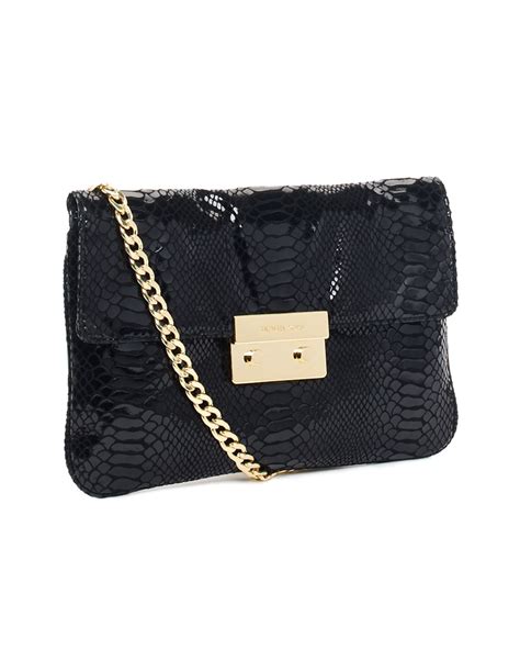 michael kors python clutch black|michael kors monogramme bags.